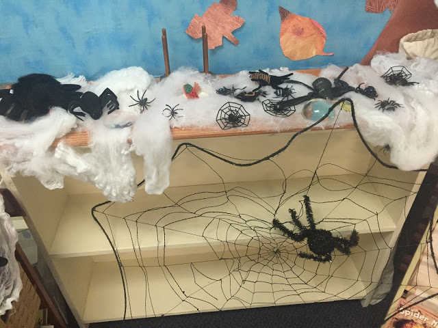 adding spiders to your science center for your kindergarten halloween party