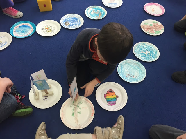 kindergarteners create a board game to apply learning about winter