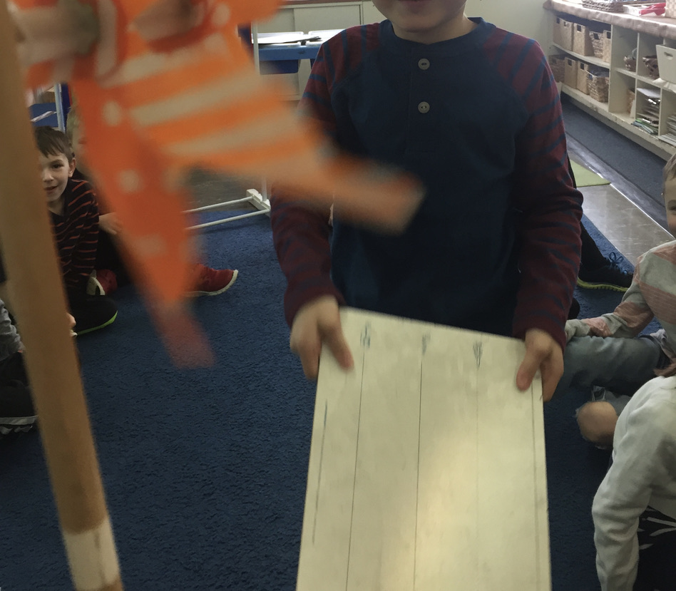 making a pinwheel move in kindergarten wind unit