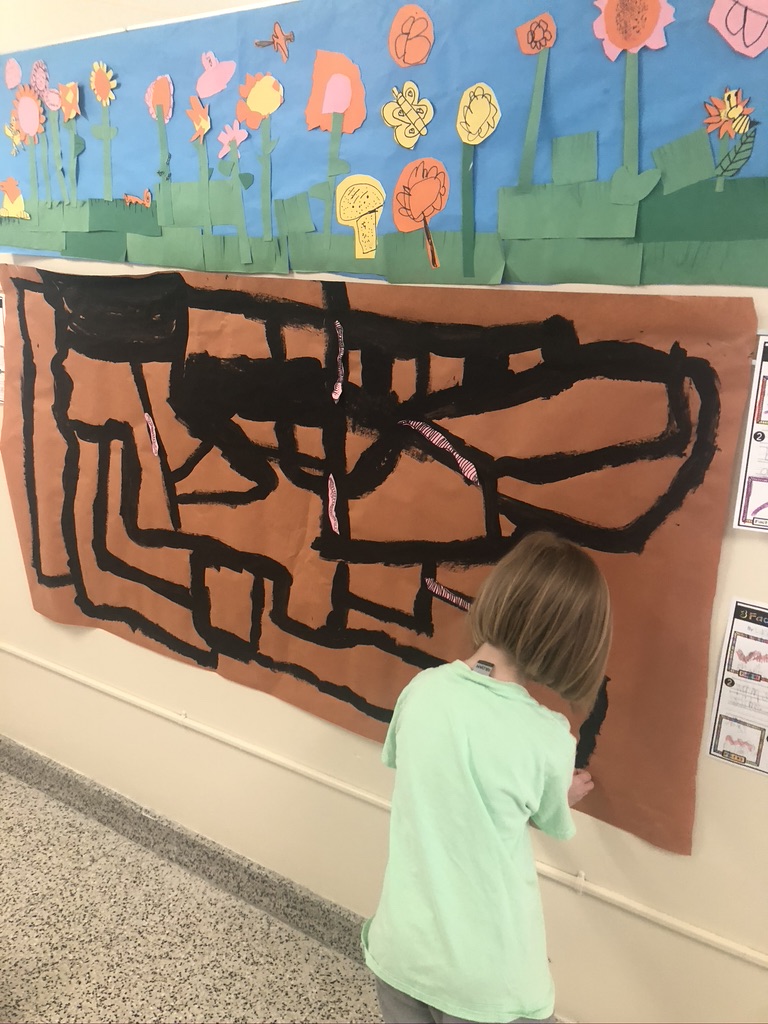 worm mural in kindergarten classroom